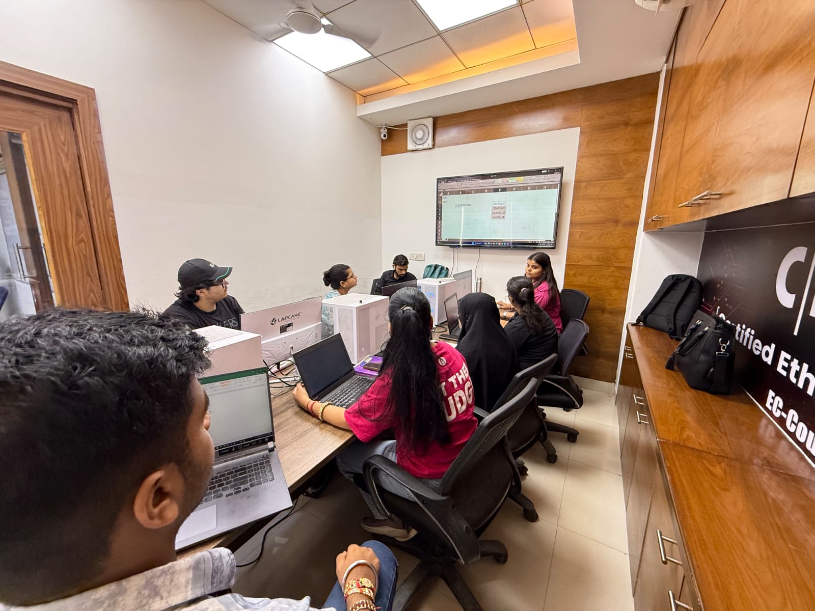 A live training session with students and a mentor